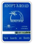 Yard Guards On Doody Adopt-A-Road Sign